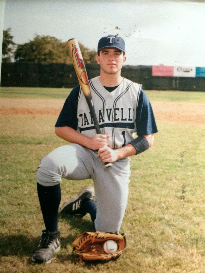 Logan playing baseball