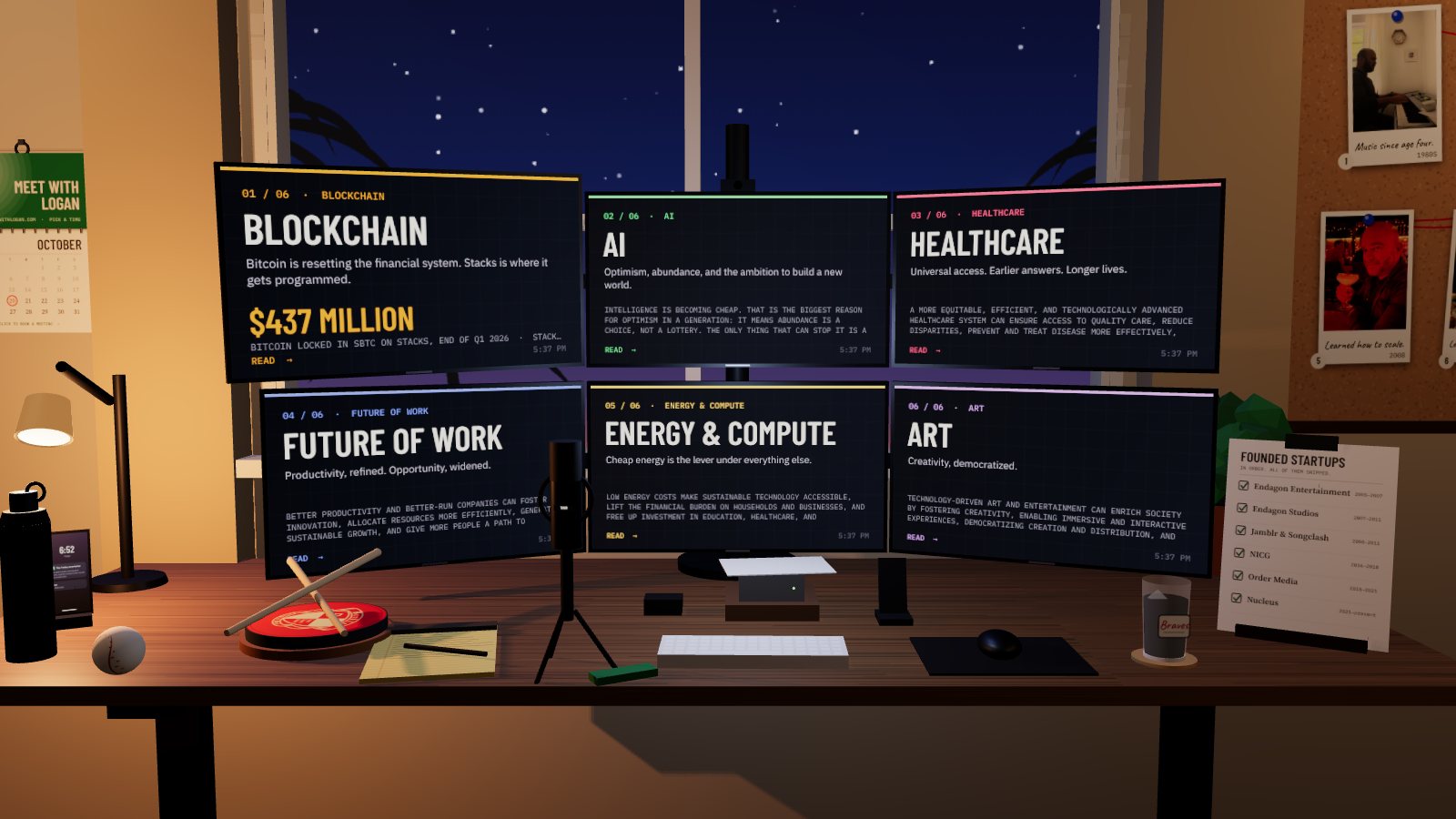 A standing desk by a window at night: six screens, three over three, a white keyboard, a mic on a tripod, a practice pad and sticks, a baseball, a legal pad, a glass of cold brew, a phone, a lamp, and a plant.